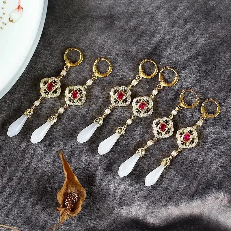 Boucles d'oreilles en diamant creux de fleur de magnolia blanc Hetian naturel, charme aristocratique de luxe chinois rétro, bijoux en argent pour femmes