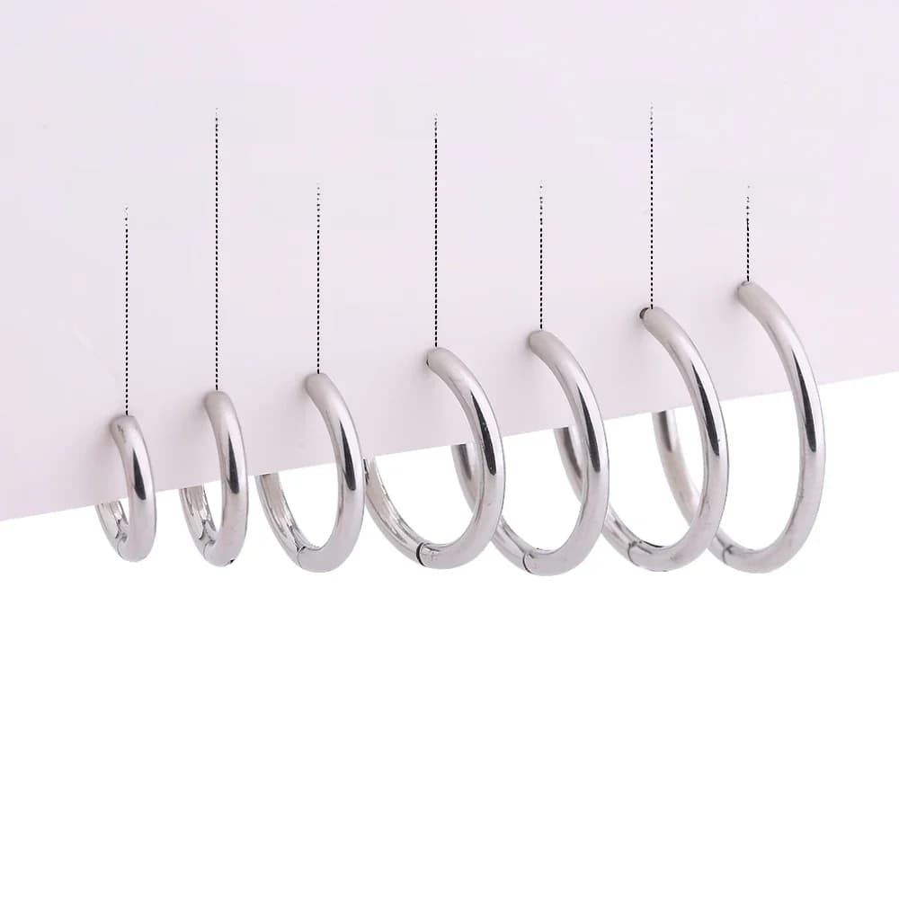 1 paire de boucles d'oreilles créoles pour hommes et femmes, bijoux de perçage en titane