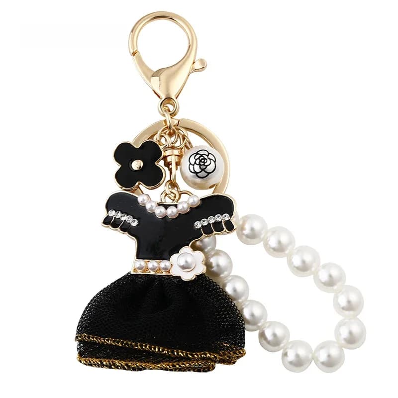Porte-clés tendance en perles noires pour femme, design jupe, bijou de sac, cadeau à la mode