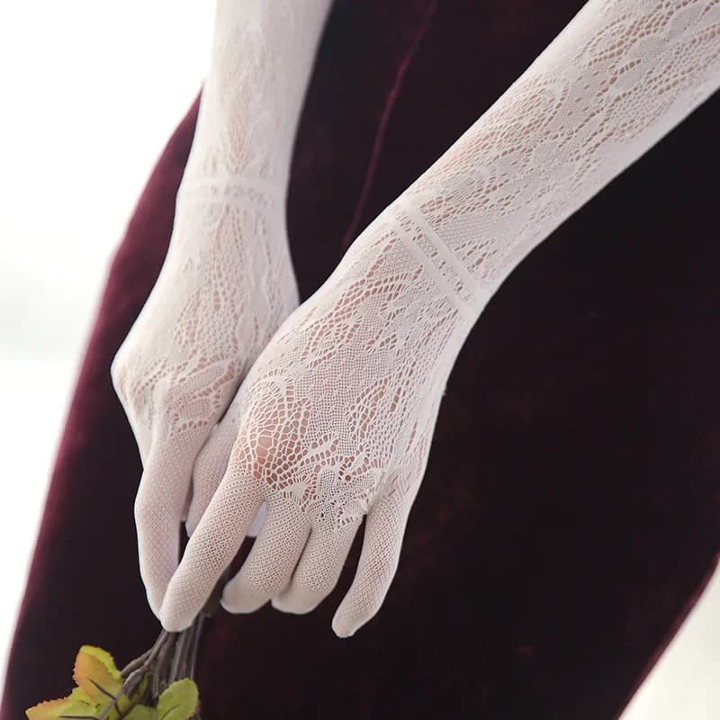 Gants Sexy en dentelle creuse pour femmes, longs, serrés, respirants, fins, élastiques, étiquette habillée, Cosplay, conduite, cyclisme, protection solaire, nouvelle collection