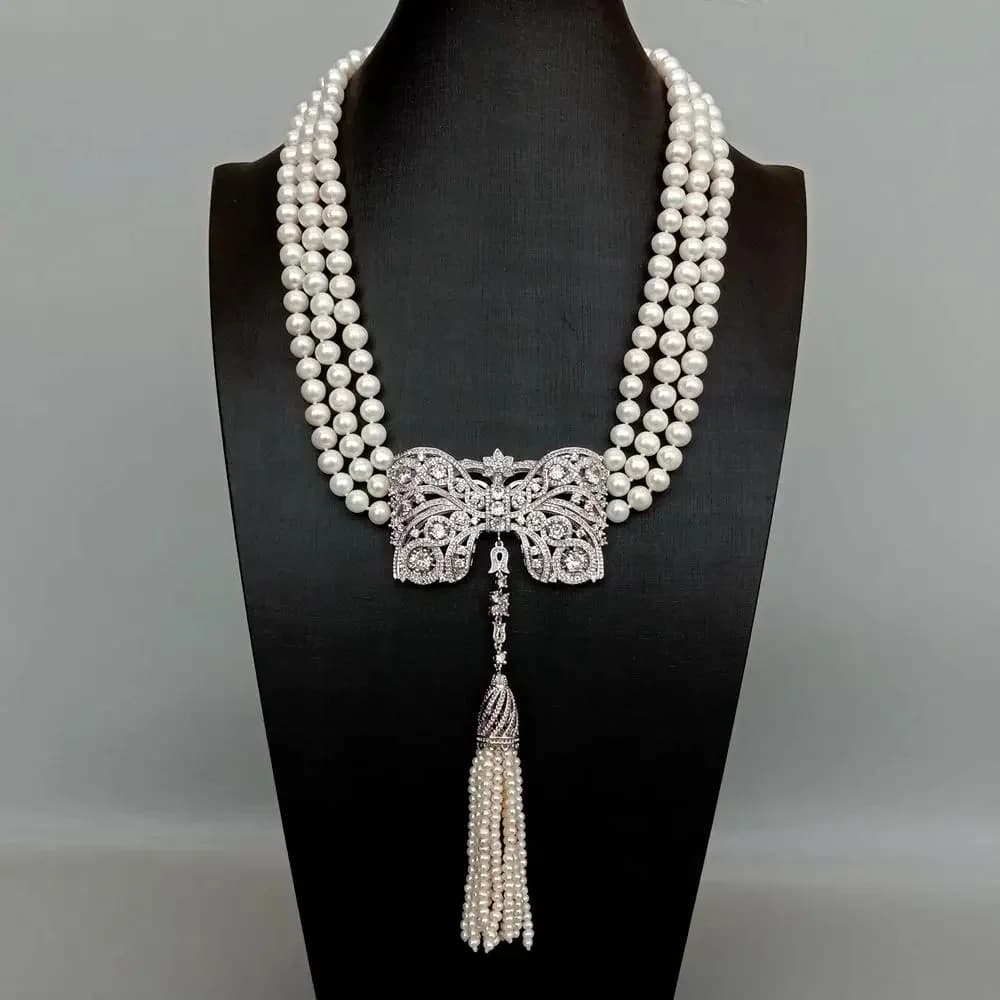 Y · YING – collier de perles blanches de culture d'eau douce à 3 brins, pendentif pompon en zircone cubique en forme de nœud papillon