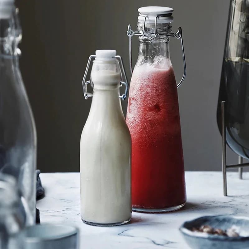 Bouteille en verre grande capacité pour jus, eau, huile, lait, soda, enzymes et vin – Design créatif pour la maison
