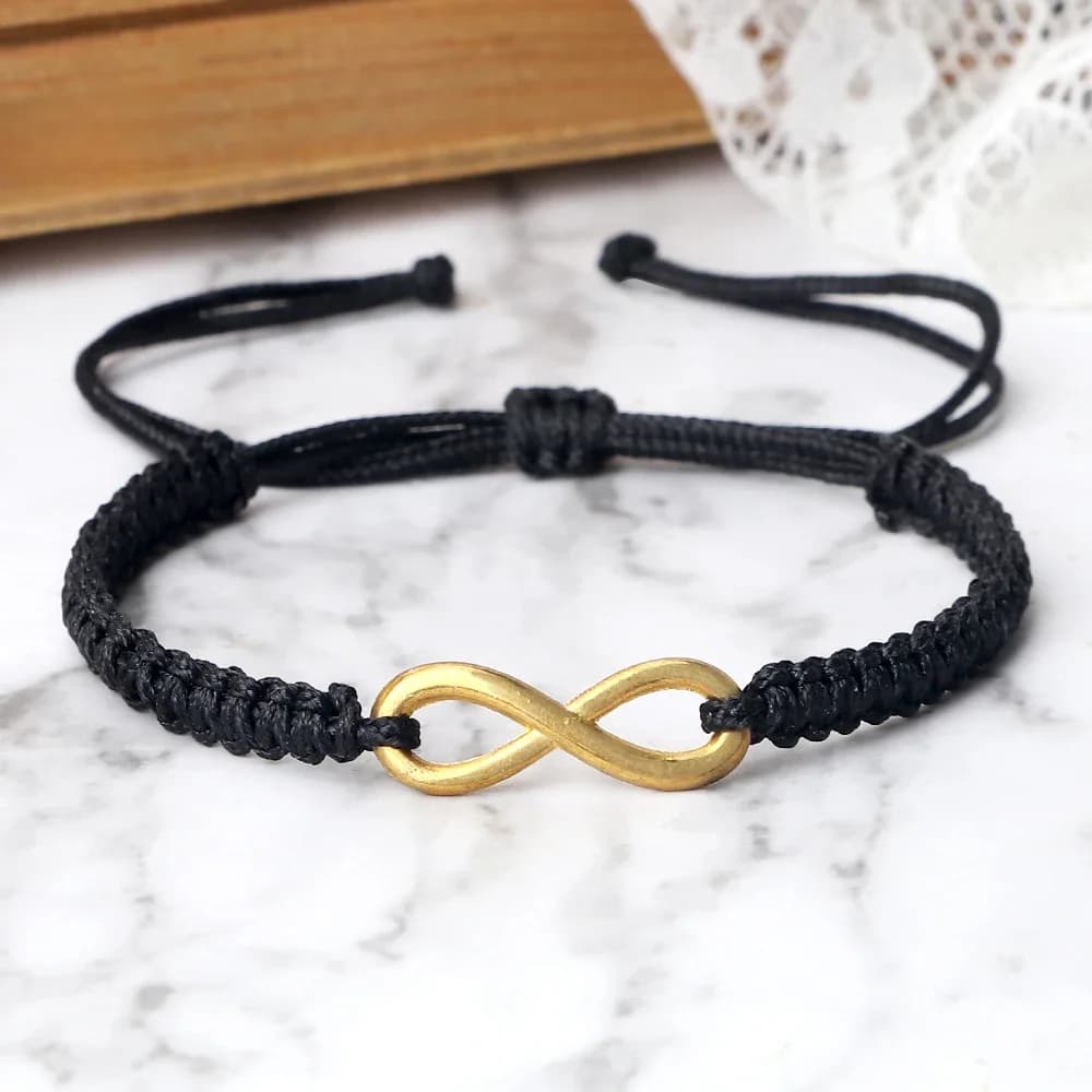 Bracelet classique Infinity tressé réglable pour couples, hommes et femmes, fait main, avec breloques, bijoux
