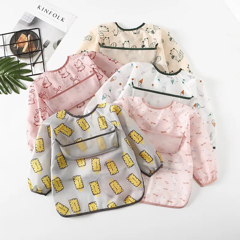 Bavoirs imperméables pour bébé, manches longues, poche, mignon, coloré, impression de dessin animé, chiffons d'alimentation, accessoires d'alimentation pour bébé