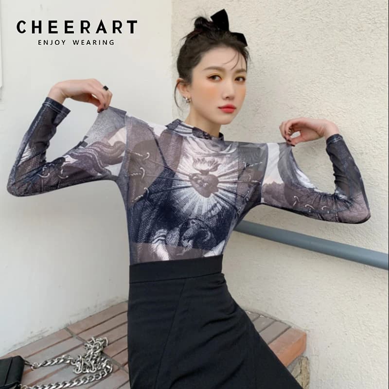 CHEERART Goth maille haut femmes tendance mode graphique t-shirts à manches longues col roulé voir à travers t-shirts vêtements gothiques