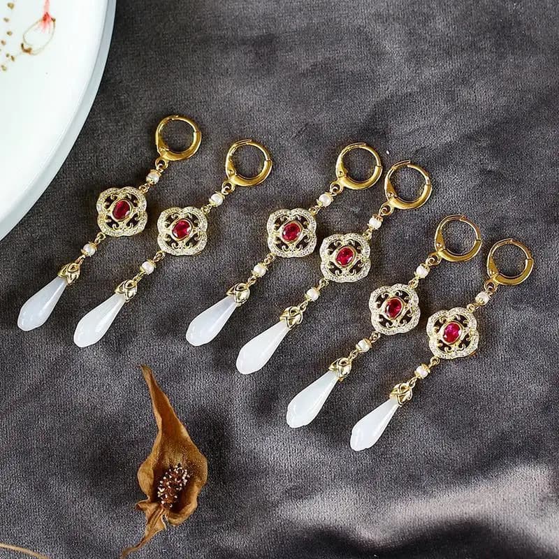 Boucles d'oreilles en diamant creux de fleur de magnolia blanc Hetian naturel, charme aristocratique de luxe chinois rétro, bijoux en argent pour femmes