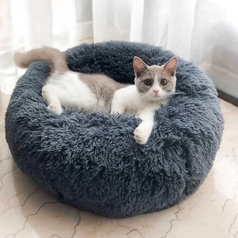 Lit pour animaux de compagnie Super doux, chenil rond pour chien et chat, sac de couchage chaud d'hiver, Long coussin en peluche pour chiot, tapis Portable, fournitures pour chats 46/50/60cm