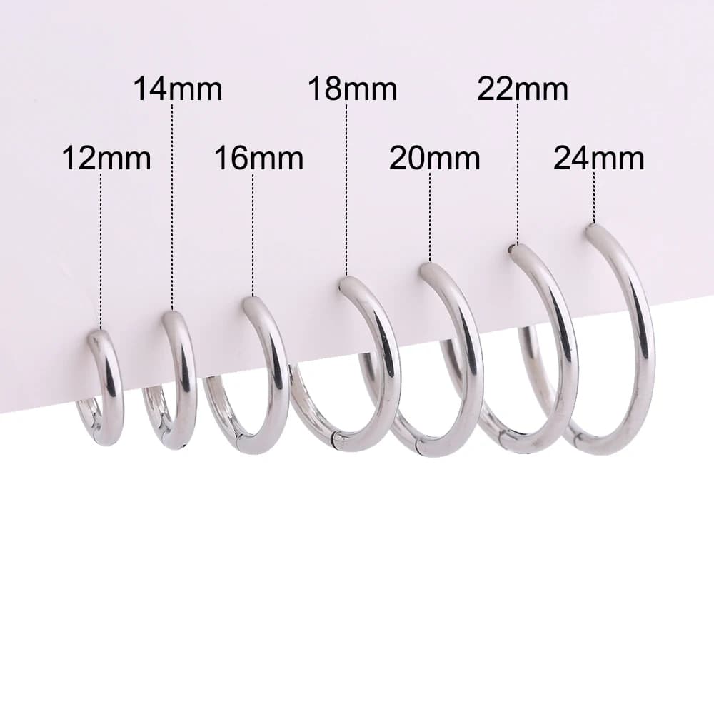 1 paire de boucles d'oreilles créoles pour hommes et femmes, bijoux de perçage en titane