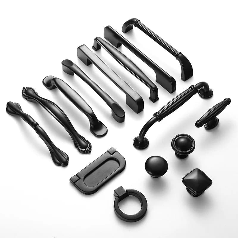 Poignées de meuble noires dans différentes formes, idéales pour placard de cuisine, armoire, ou tiroirs de commode