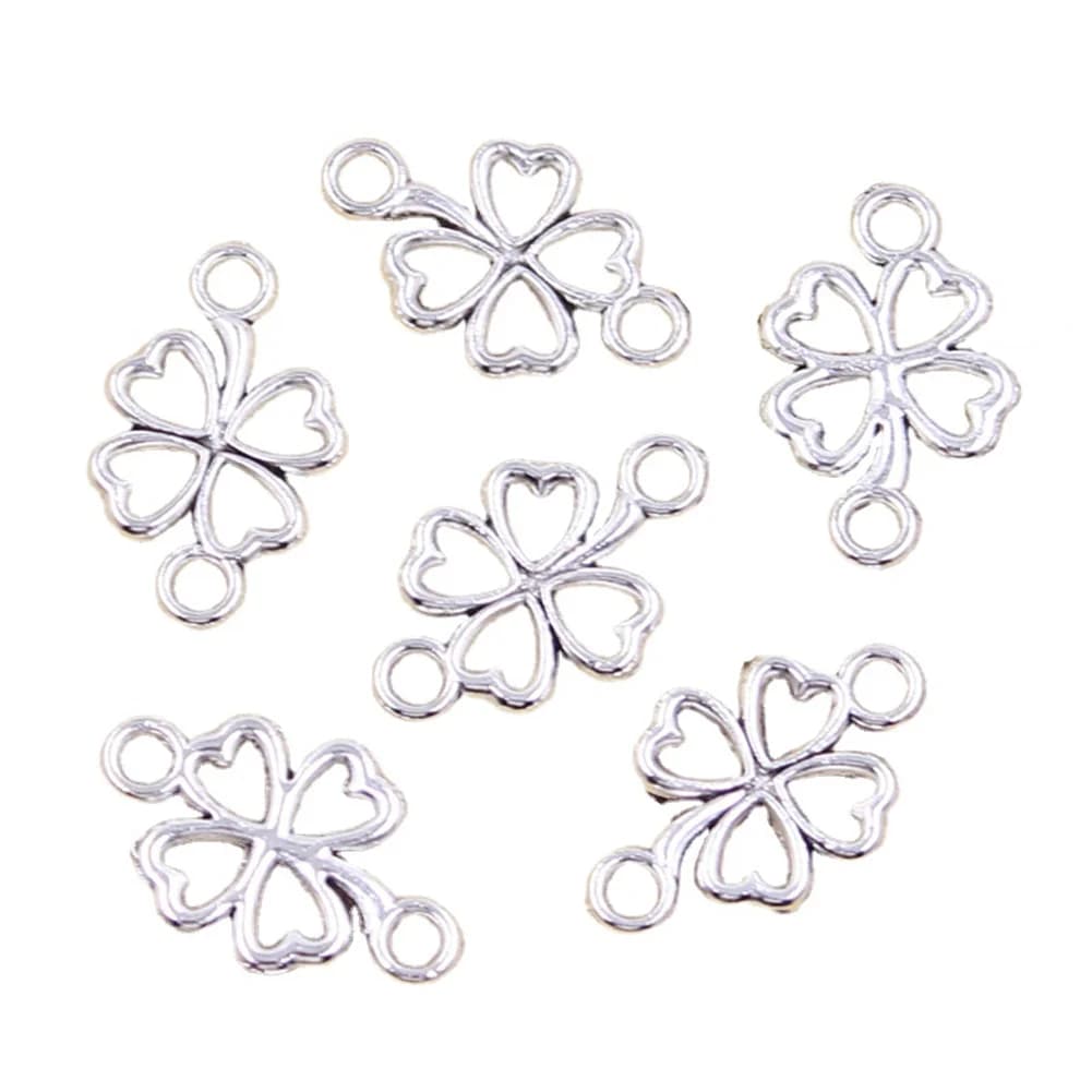 30 pièces breloques chanceux irlandais trèfle à quatre feuilles lien 20x12mm Antique couleur argent pendentifs faisant bricolage à la main tibétain trouver des bijoux