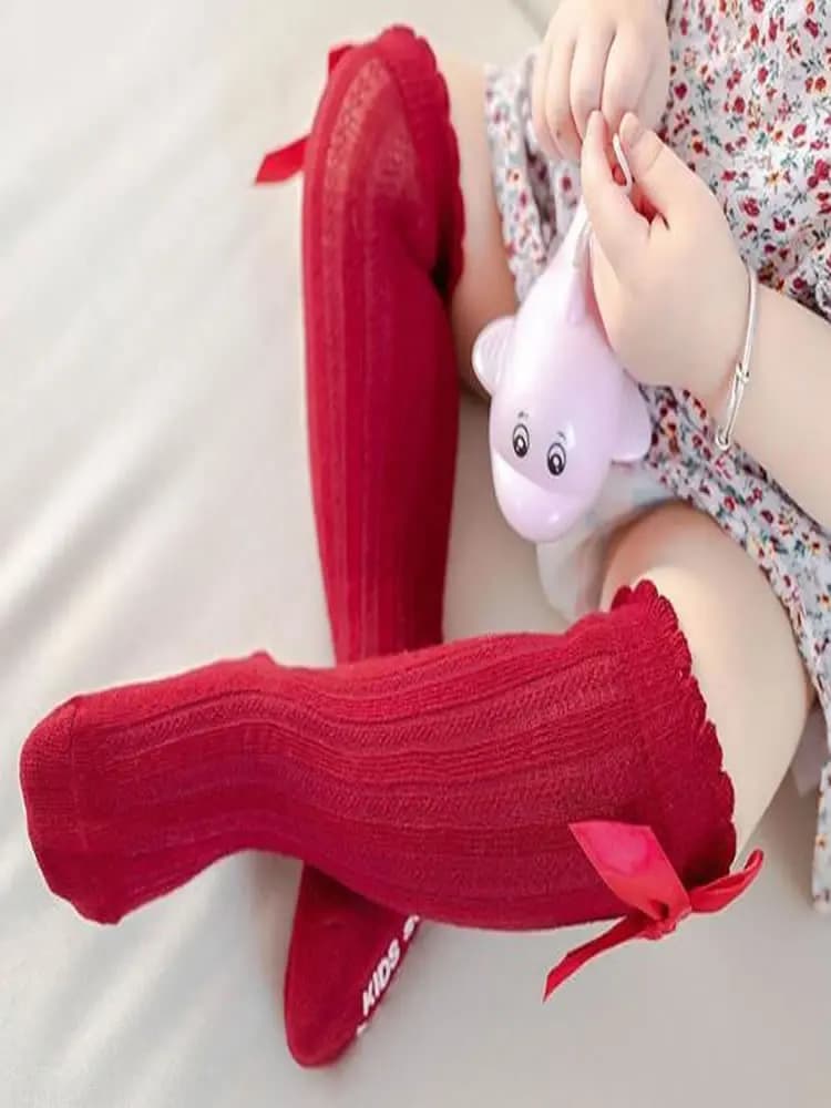 Bas à rayures de couleur unique pour filles, nouveaux bas à bouche bulle, nœud papillon, antidérapants en coton, bas en dentelle pour tout-petits