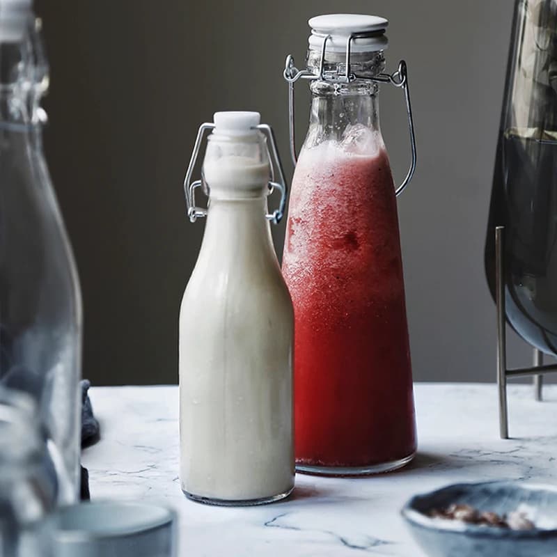 Bouteille en verre grande capacité pour jus, eau, huile, lait, soda, enzymes et vin – Design créatif pour la maison