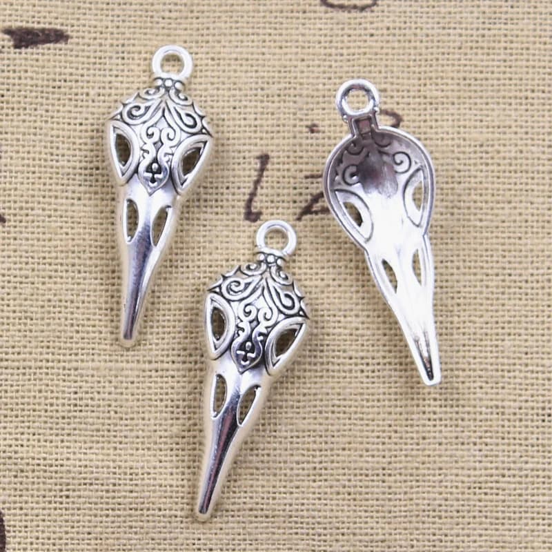 15 pièces breloques crâne bec squelette oiseau 35x13mm Antique couleur argent pendentifs bricolage artisanat faisant des résultats bijoux tibétains faits à la main