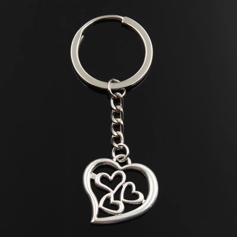 Porte-clés de voiture en forme de cœur creux pour hommes, pendentifs de couleur argent, bijoux de bricolage, support de porte-clés, Souvenir, cadeau, 28x27mm