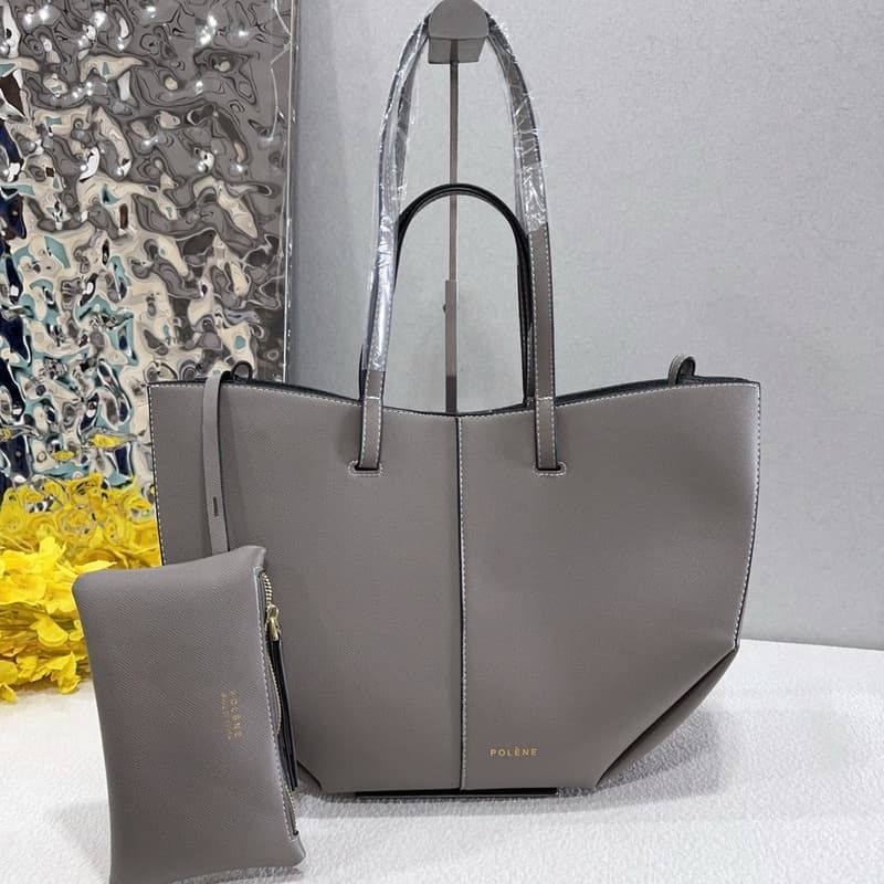 Sac cabas élégant pour femme avec poche intérieure, porté main ou épaule, design durable et éco-responsable.