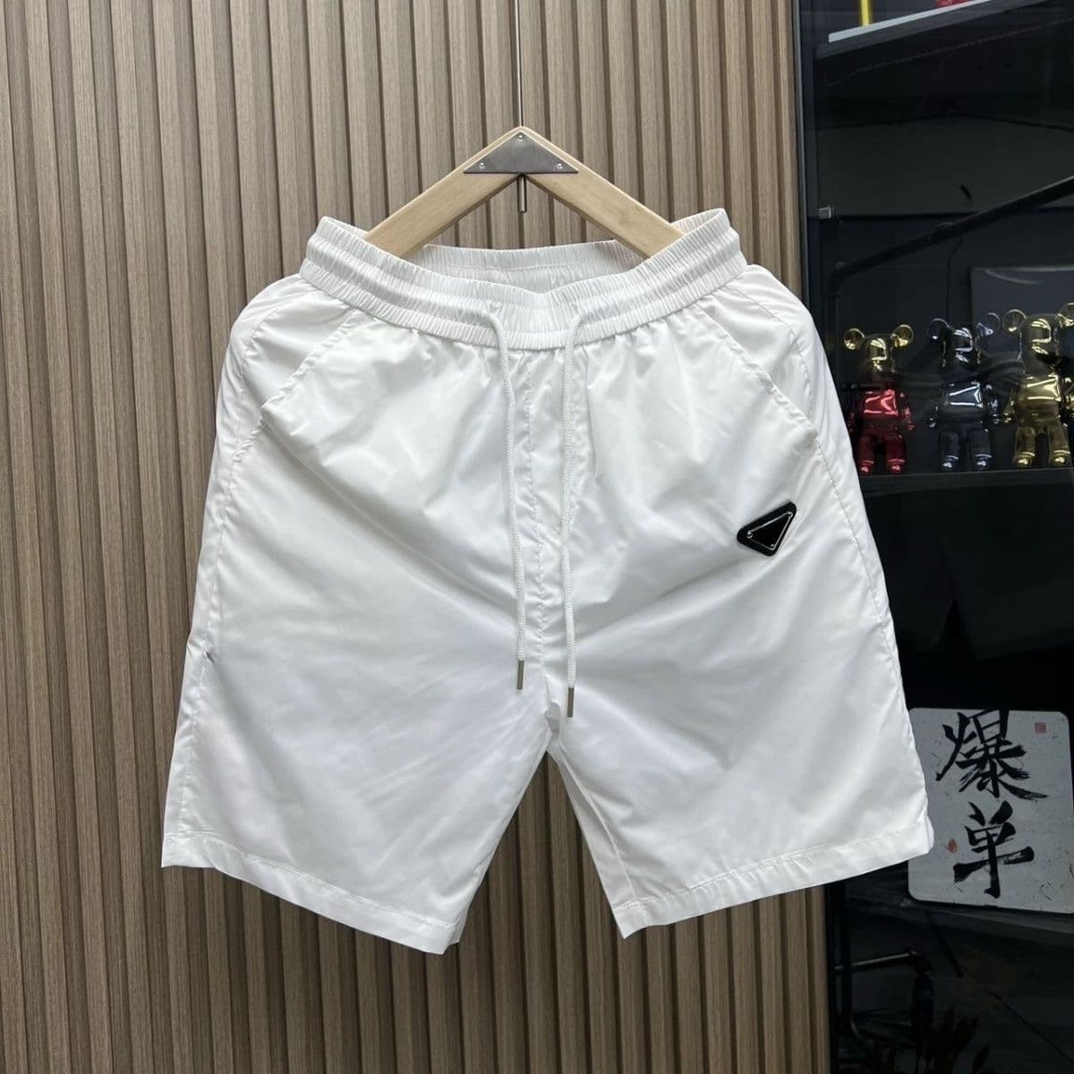 Short de sport décontracté haut de gamme pour homme, tendance, à séchage rapide, polyvalent, fin, coupe cinq points, idéal pour l'été.