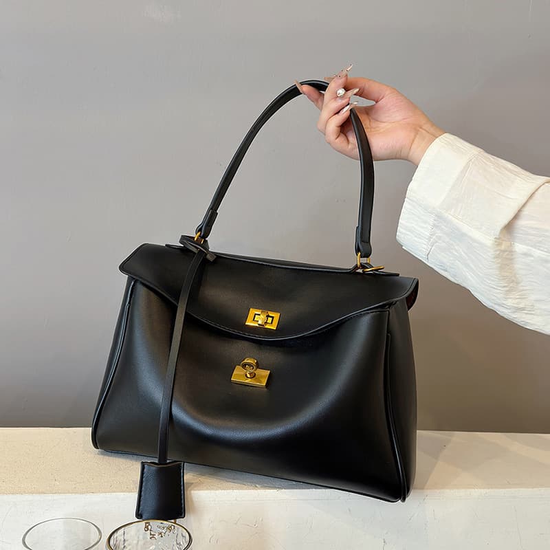 Hand held platinum bag for women 2024 new style Korean niche underarm bag high end stylish large capacity commuter bag