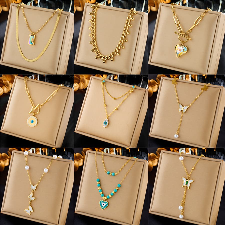 Fashionable niche creative simple pearl butterfly colorful rhinestone love pendant tassel chain multi-layered necklace