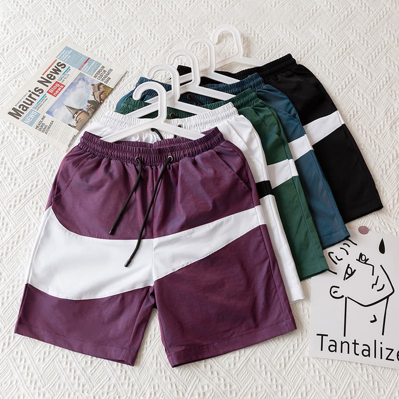Shorts men wear summer Beachwear casual pants young students loose fashion versatile panties