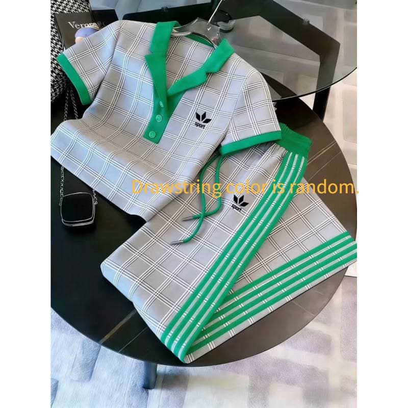 Ensemble deux pièces pour femme : polo imprimé 3D, pantalon large à manches courtes et color block.