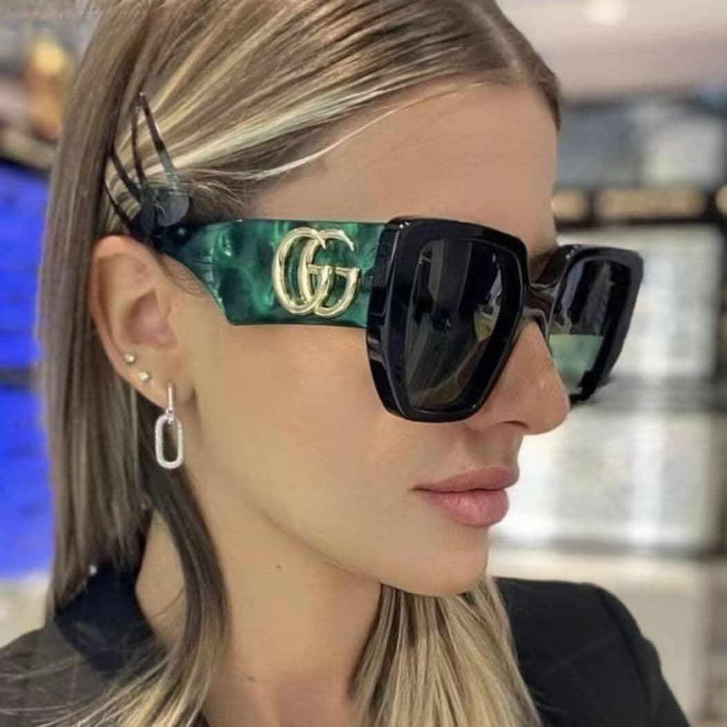 Lunettes de soleil géométriques de marque GG0956S 003 Noir/Or 54mm 956