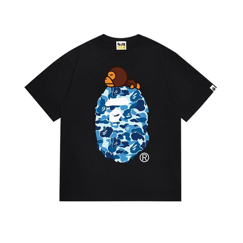 T-shirt enfant à manches courtes imprimé d'un requin, motif homme-singe. 100% coton.