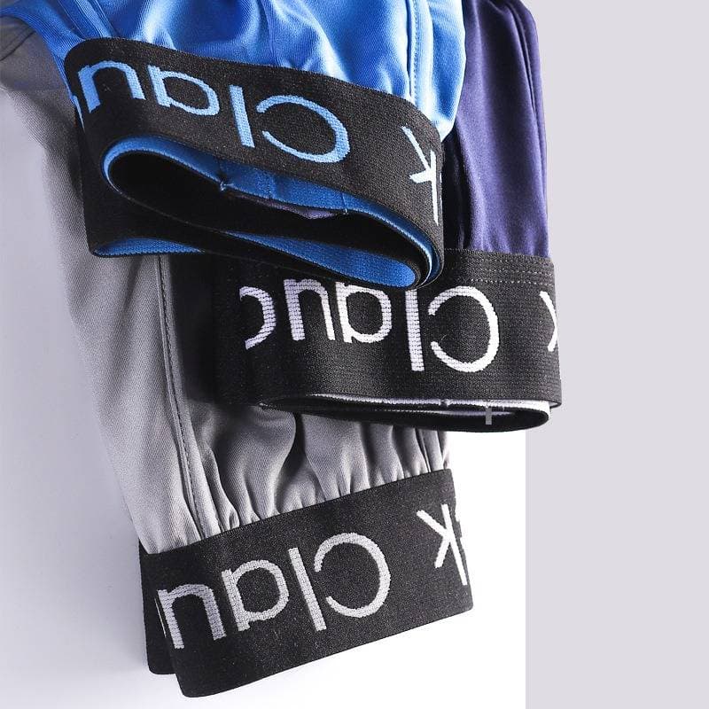 Men's new underwear cross border foreign trade mid waist boxer briefs solid color comfortable breathable boxer briefs wholesale