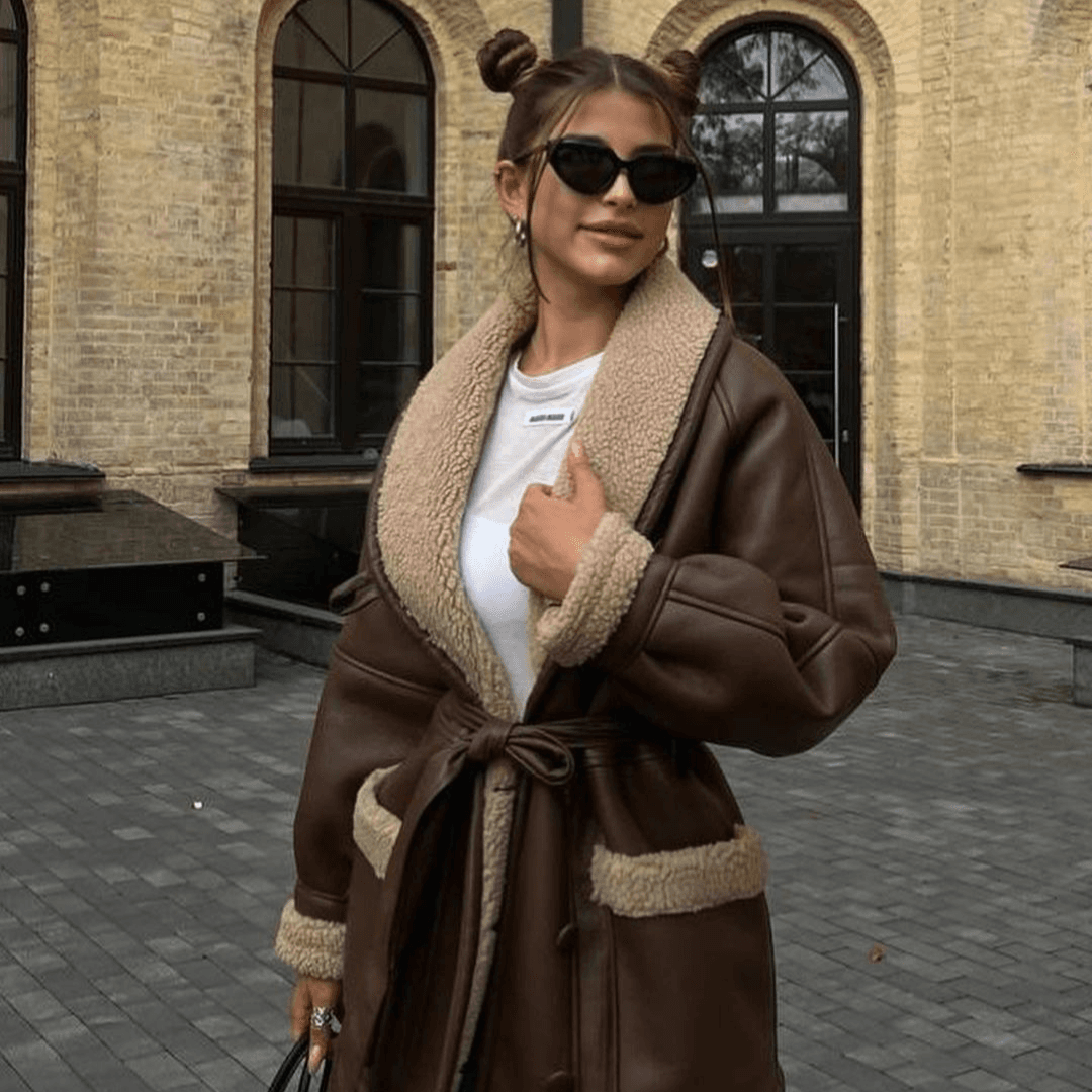 Women's autumn and winter new fashion temperament fur long sleeve stitching coat women