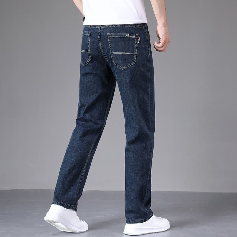 Jeans homme haut de gamme à jambes larges, coupe droite et ample, idéal pour le printemps et l'automne. Pantalon décontracté et tendance, élasti