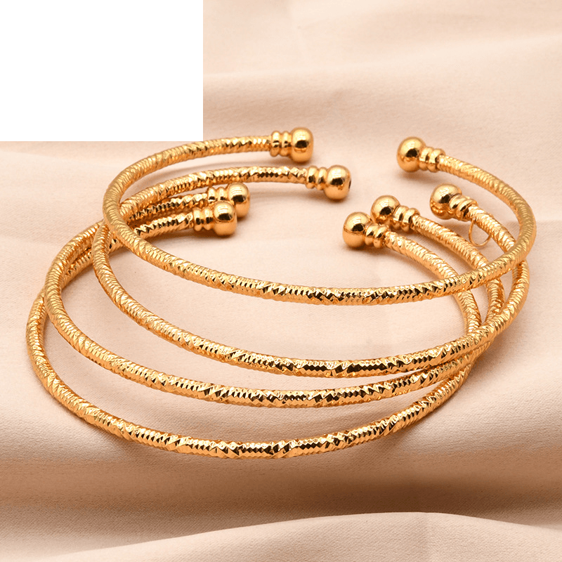 Cross-border Dubai bride gold-plated bracelet jewelry women's wedding bell leaf pendant bracelet jewelry wholesale
