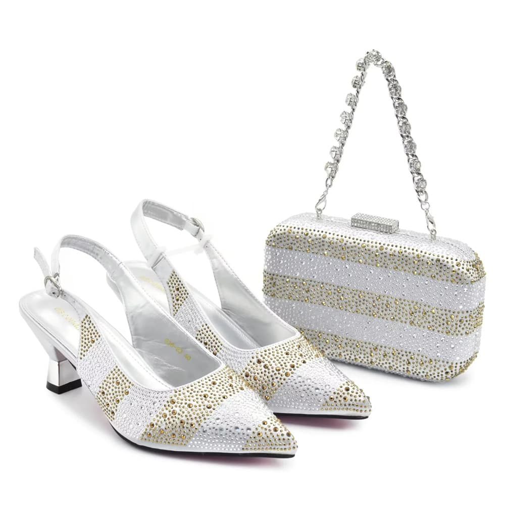 Accessorize the evening with shredded diamond embellished high-heeled sandals and a hard-box handbag set