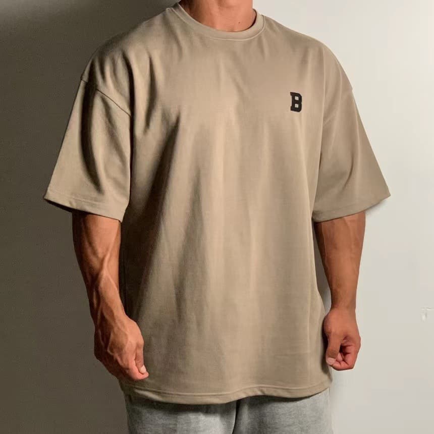 Men's Clothing Summer Short Sleeved Men's Sports Fitness Training Suit Casual Loose T Shirt Drop Shoulder Heavy Cotton Short Sleeved T Shirt