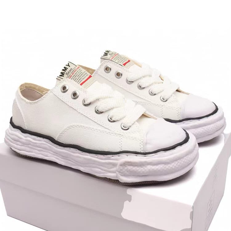 Nouvelles chaussures de planche décontractées MMY SanNew Kang Mouth Smile Dissolved Campus Snow Cake Bottom Low Top Couple