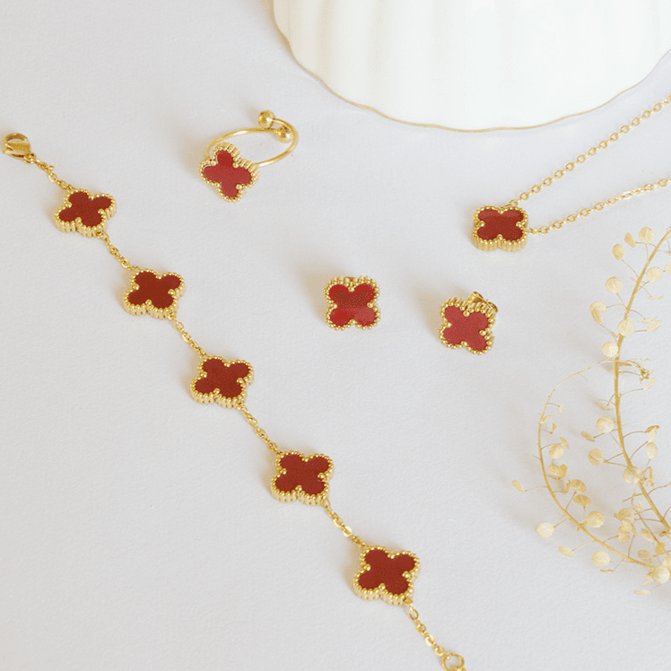 Ensemble de quatre boucles d'oreilles et collier en forme de trèfle à quatre feuilles, élégant et porte-bonheur, chaîne de clavicule dorée