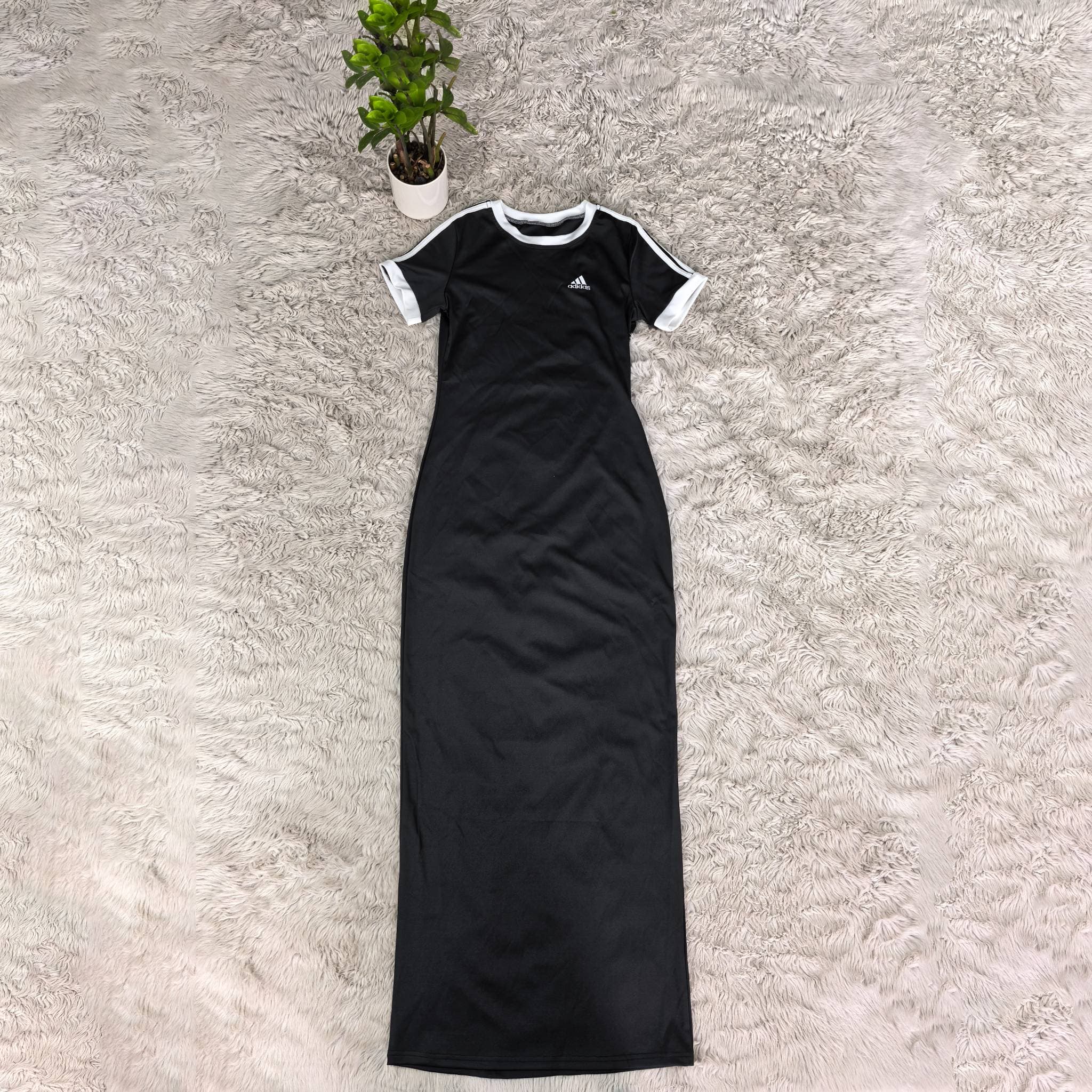 Robe sans manches sexy amincissante et tendance 2026