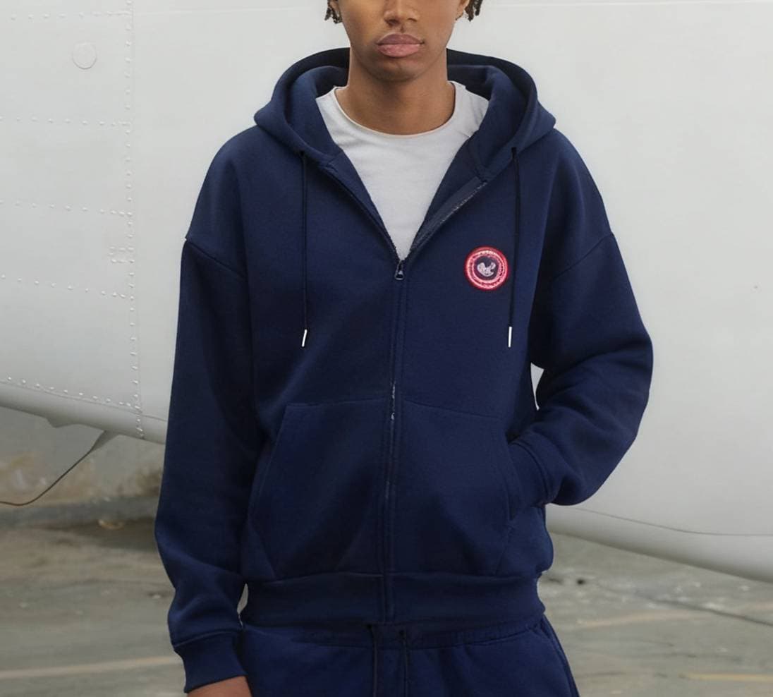 Pantalon de survêtement homme style hip-hop urbain, capuche zippée, manches longues, polyester noir, coupe basique micro-élastique, idéal pour le