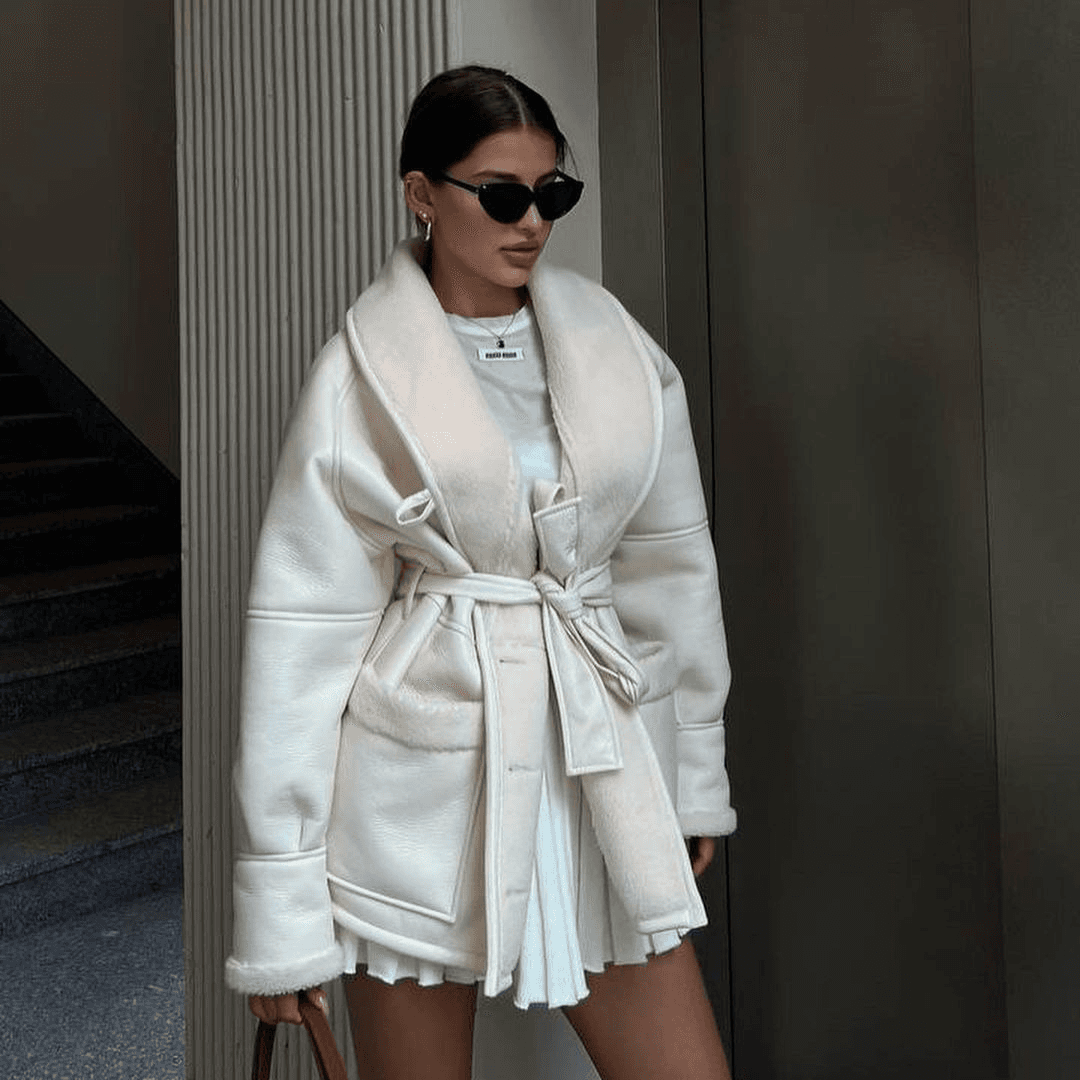 Women's fashion temperament fur one Korean version long sleeve splicing coat