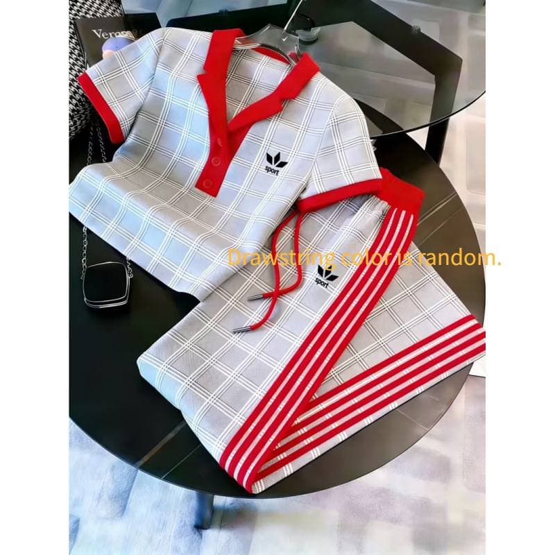 Ensemble deux pièces pour femme : polo imprimé 3D, pantalon large à manches courtes et color block.