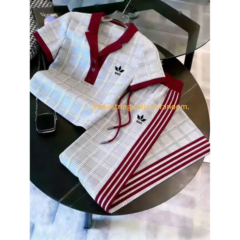 Ensemble deux pièces pour femme : polo imprimé 3D, pantalon large à manches courtes et color block.