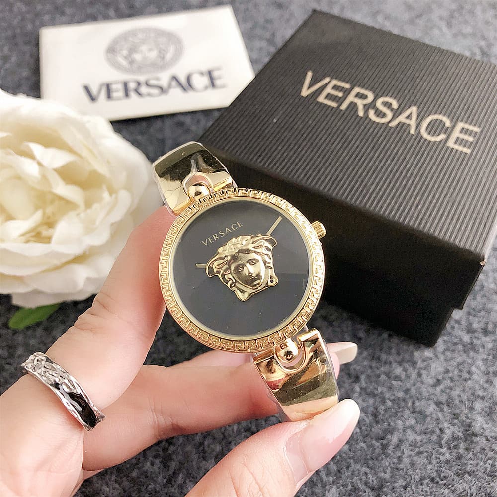 e grand logo mode tendance fille jolie simple avant-garde gaufré généreux bracelet bracelet en acier montres pour femmes