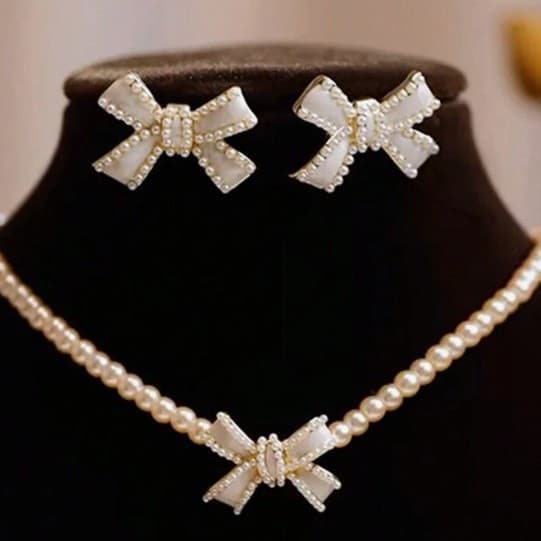 Temperament short clavicle necklace pearl bow necklace net celebrity retro French princess