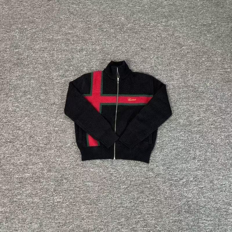 Gilet en maille zippé pour homme Corteiz, col montant, motif jacquard croisé rouge et vert, logo brodé sur le devant, coupe ample, idéal pour l'a
