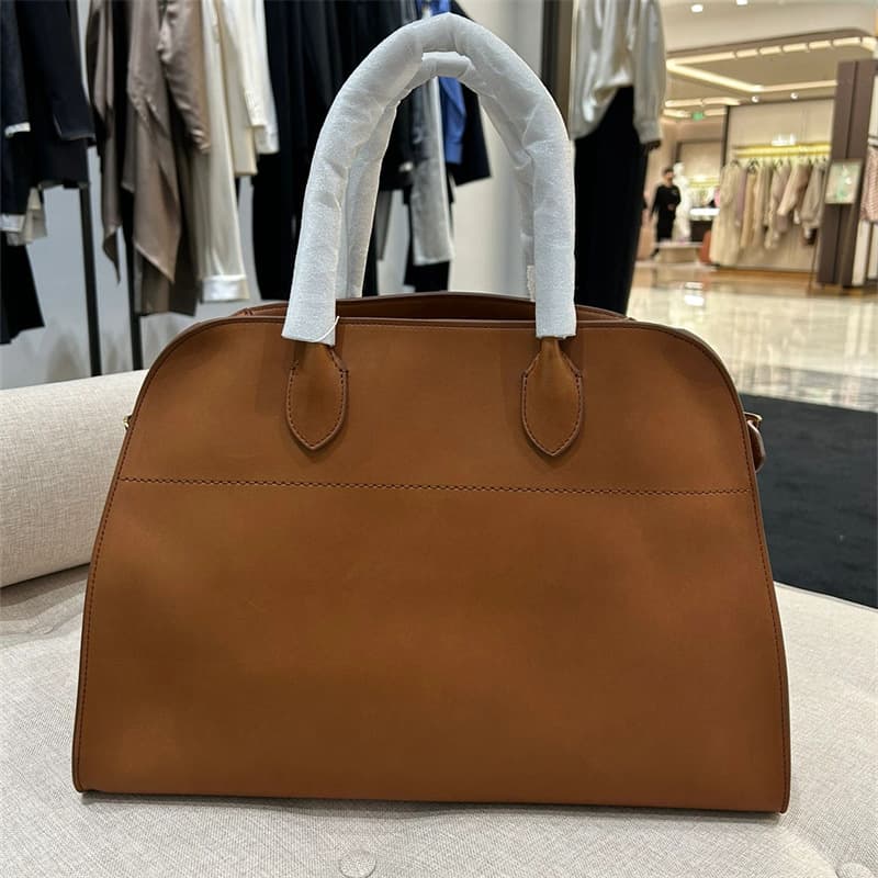 Le sac fourre-tout en cuir de vache à couche supérieure Margaux 15 de grande capacité pour les déplacements quotidiens Le même sac à bandouliè