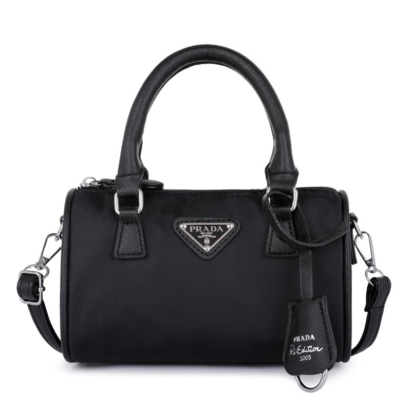 Classique rétro grandes dames rondes en nylon sac pour femmes triangle étiquette bandoulière sac à main épaule éclatée net rouge mêmes modèl