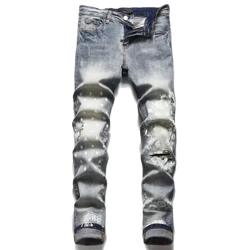 Jean homme de créateur, style motard, déchiré et usé, coupe slim, pantalon en denim.
