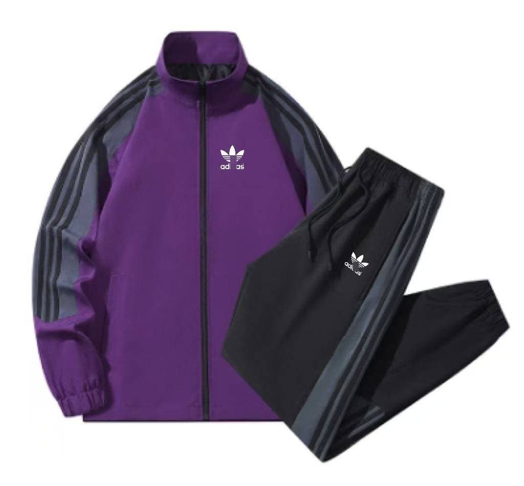 Ensemble de survêtement décontracté pour homme, composé d'une veste zippée à col montant et d'un pantalon de jogging, avec bandes latérales.