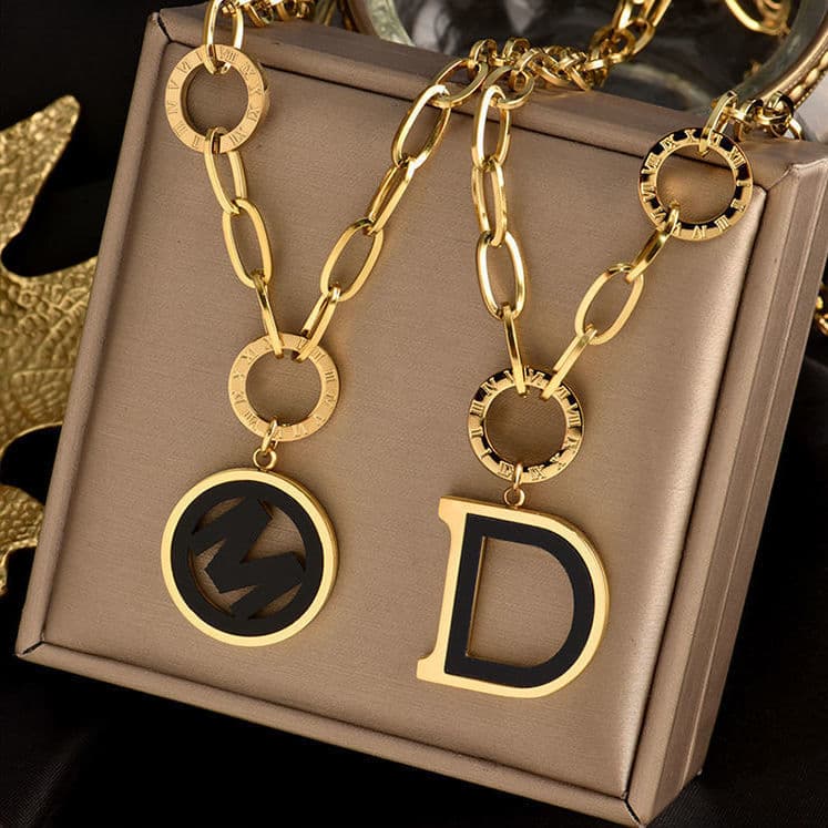 Designer fashion trend Letter D Titanium steel sweater chain Roman letter M Titanium steel necklace superior sense light luxury extended chain