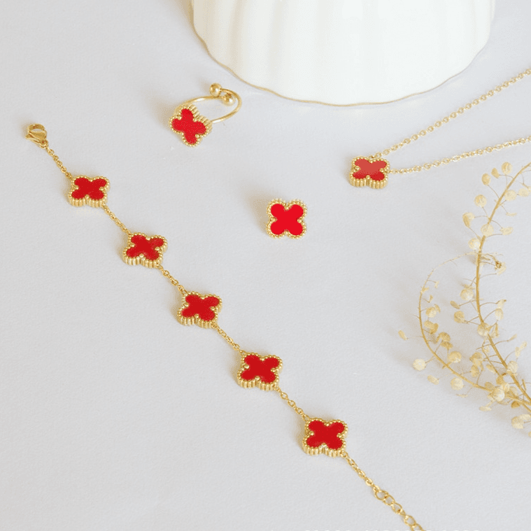 Ensemble de quatre boucles d'oreilles et collier en forme de trèfle à quatre feuilles, élégant et porte-bonheur, chaîne de clavicule dorée