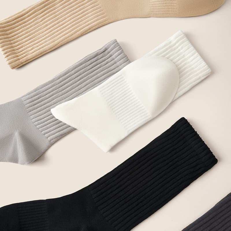 5pcs Lumi socks men sweat-absorbent mid-tube socks business casual deodorant sports black and white men's thick long socks wholesale