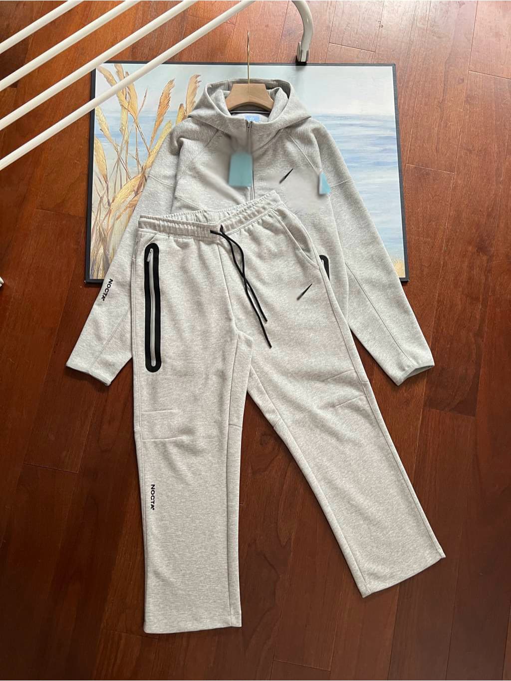 Veste de survêtement unisexe 2025, coupe-vent, à capuche zippée, style sport, avec petit crochet.